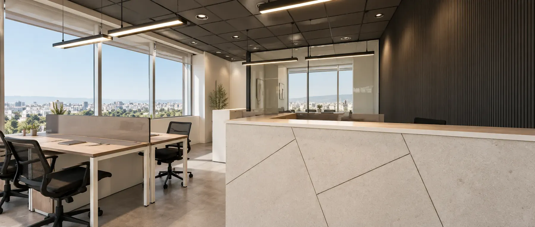 Oficina corporativa moderna con recepción y puestos de trabajo - Depton Arquitectura